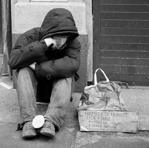 Homeless Person With Cup