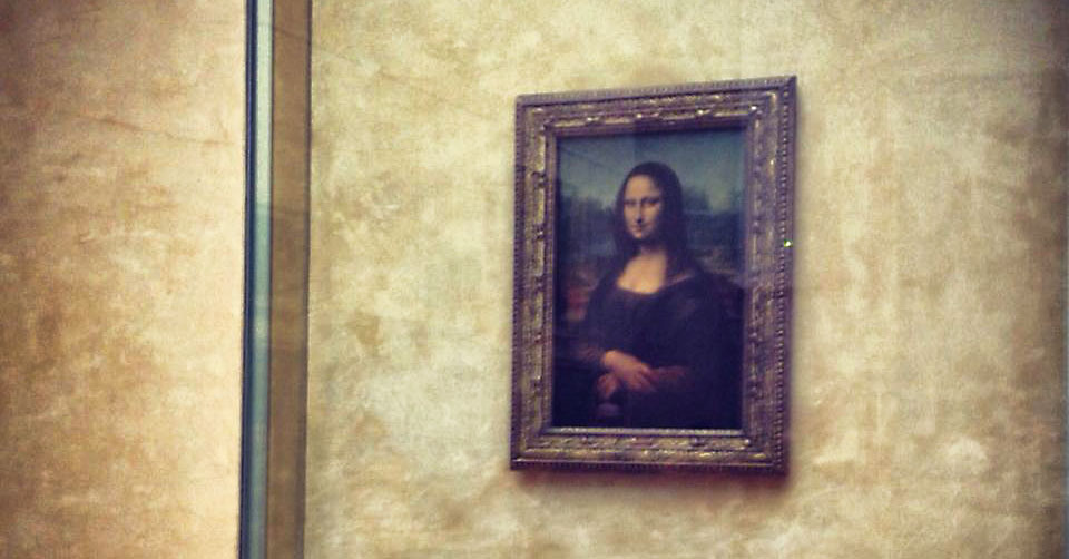 The Mona Lisa, shown here in the Louvre